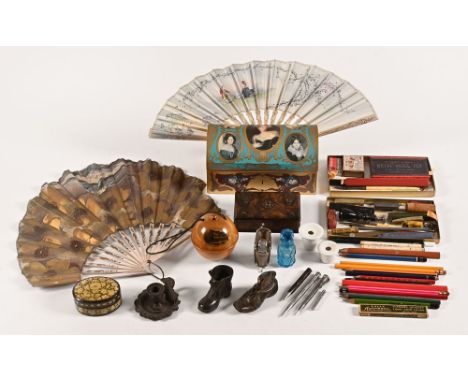 A quantity of collectibles, including a Mauchline ware string dispenser, two boxes, two scent bottles, bronze chamber stick, 