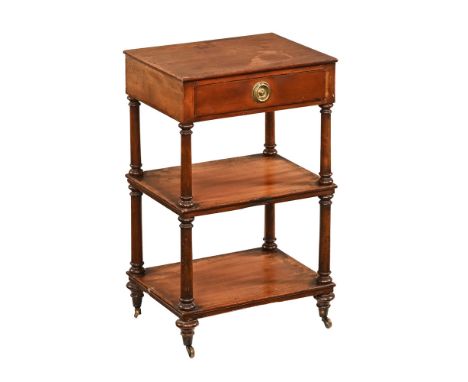 A Victorian mahogany small whatnot stand, with drawer and two open tiers and all raised on short turned legs terminating in c
