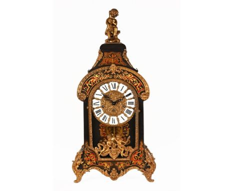 A reproduction faux boulle marquetry French bracket clock, with Roman numerals and three train striking movement.  Height 76 