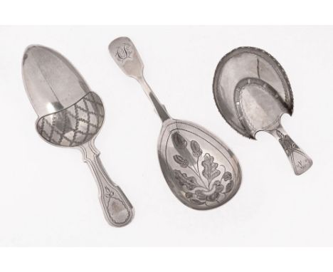 A George III silver caddy spoon, London 1813 acorn pattern, maker Joseph Ash I, together with a horseshoe shaped caddy spoon,