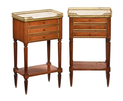 A pair of continental marble topped bedside cabinets, each fitted with three drawers and with open shelf beneath and raised o