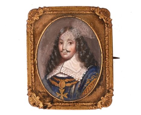 An antique miniature of a Carolean style male figure on ivory, and with gilt metal frame.  Overall dimensions 46 mm x 38 mm. 