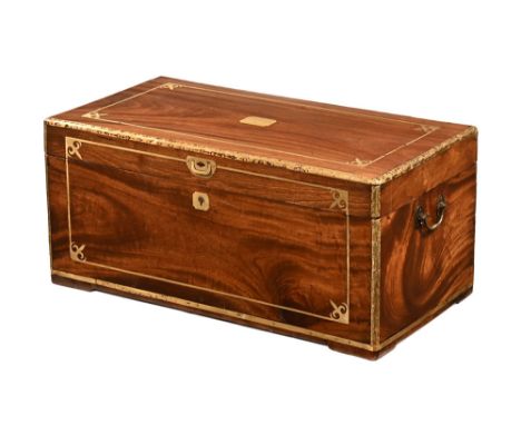 A 19th century camphorwood brass inlaid military trunk, with carrying handle to either side.  Height 41 cm, width 91 cm, dept