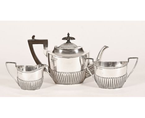 A Walker & Hall three piece silver tea service, teapot, milk and sugar.  Overall weight 549 grams (see illustration).