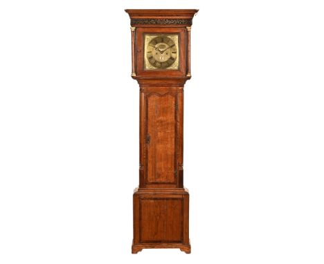 A Georgian oak and mahogany crossbanded longcase clock case, with brass dial marked John Porthouse Penrith and with Georgian 