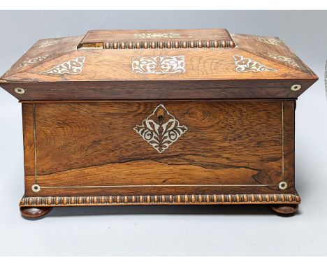 A William IV rosewood tea caddy with mother of Pearl inlay 33cm