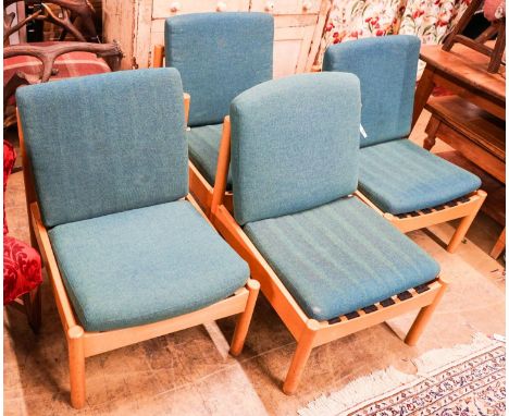 A set of four Ercol pale beech lounge chairs with cushion seats and backs, width 60cm, depth 66cm, height 82cm