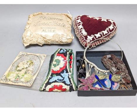A cream silk pin baby cushion, a valentine cushion, a miser's purse, appliques and sequin collar