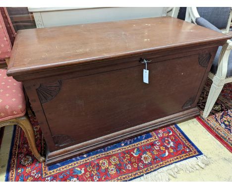 A large rectangular carved teak trunk, length 116cm, depth 58cm, height 64cm