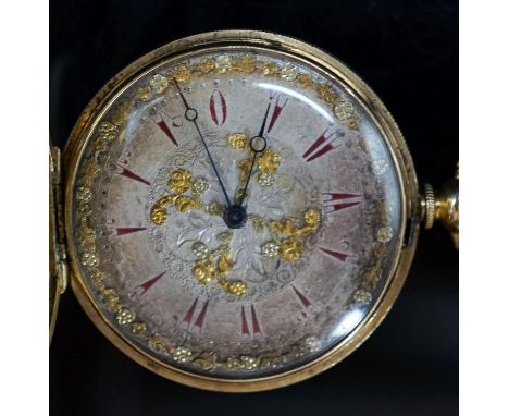 A continental engine turned 18k yellow metal hunter fob watch, with ornate dial, cased diameter 36mm,gross weight 33.8 grams.