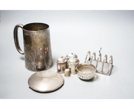 An Edwardian silver mug, by Walker &amp; Hall, Sheffield, 1901, 12.4 cm, a silver toastrack, silver compact, four silver cond