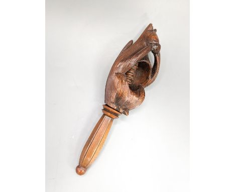 An 18th/19th century fruitwood 'squirrel' nut cracker, 16.3cm