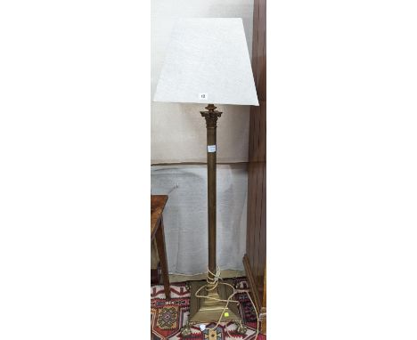 An early 20th century brass Corinthian column standard lamp