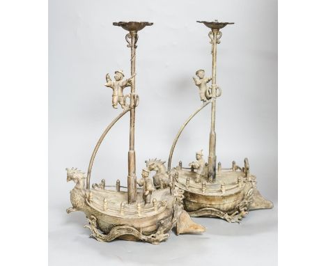 A pair of Chinese brass ‘ship’ lamp stands, 41cm