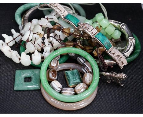 A group of bangles  and necklaces including jade and agate.