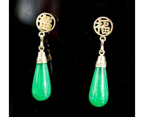 A pair of Chinese yellow metal mounted teardrop shaped jade earrings, 21mm, gross weight 5.1 grams.