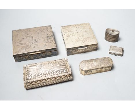 A George IV silver vinaigrette (lacking grille), Birmingham, 1825, 33mm, a Dutch white metal snuff box, and four other silver