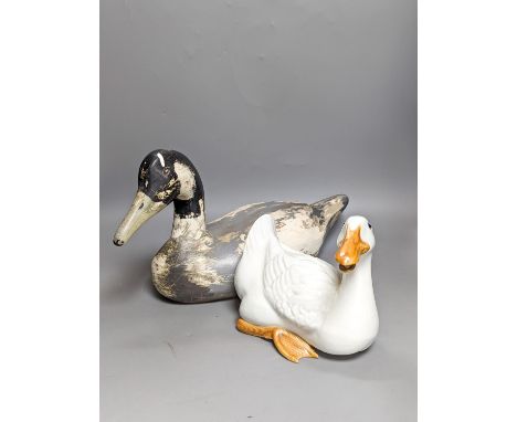 A modern painted decoy duck and a 20th century Chinese ceramic model duck (2) 42cm