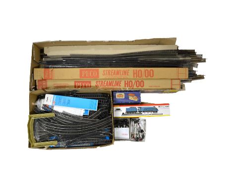 A collection of OO/HO gauge model railway track and trackside accessories, including Hornby Dublo D1 signal cabin; Hornby rol