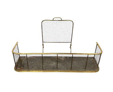 A Victorian brass and steel fire fender, 120cms wide; together with a brass fire screen, 50cms wide (2). Provenance: property