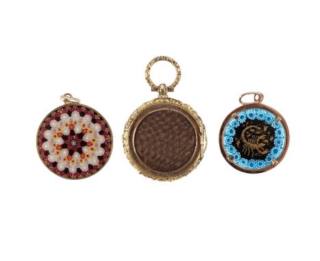 Two yellow metal mounted continental millefiori glass pendants; together with a Victorian mourning pendant set with a daguerr