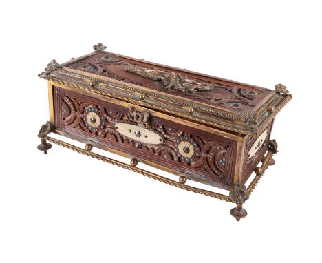A 19th century Black Forest brass mounted casket, with applied hunting tableau to the lid, 27cm wide.