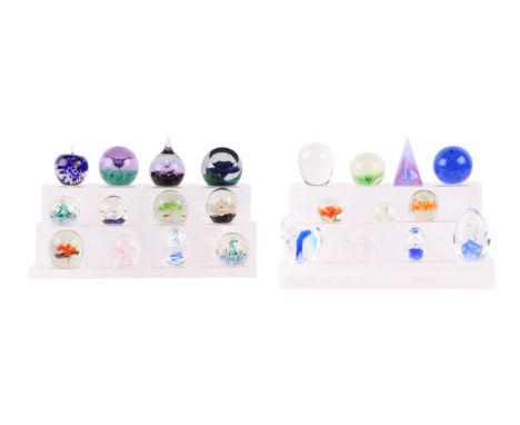 A large quantity of Art Glass paperweights to include Caithness.