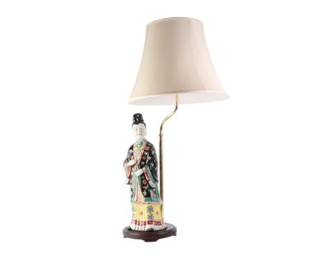 A Chinese famille rose figural table lamp in the form of a robed lady, the figure 48cms high, overall 88cms high including sh