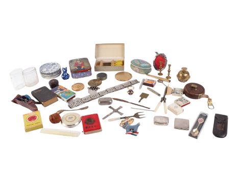 A quantity of small collectable items to include tape measure, crucifix, scissors and compacts.