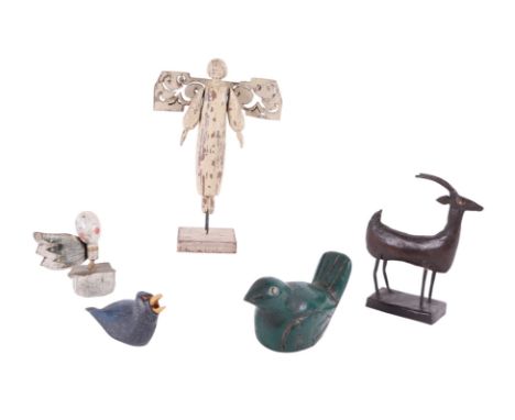 A folk art figure of an angel, 26cms high; and other similar items.