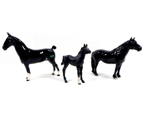 A group of three Beswick horses, including 'Hackney - Black Magic of Nork', model 1361, black - gloss, 19.7cm high, 'Fell Pon