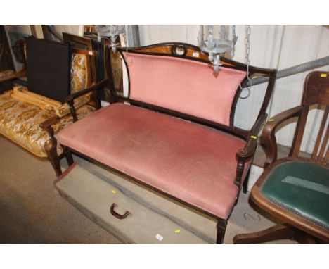 An Edwardian salon sofa