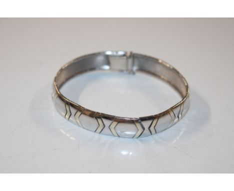 A Sterling silver articulated bangle bracelet, approx. 21gms 