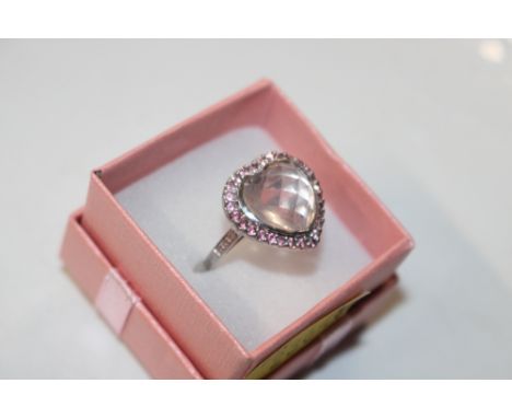 A Sterling silver dress ring set with rose and amethyst, size T