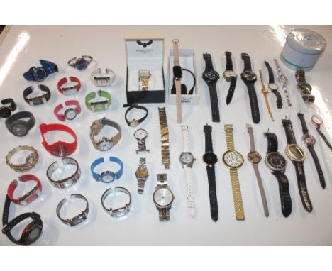 A large quantity of various wrist watches to include a Casio Baby G