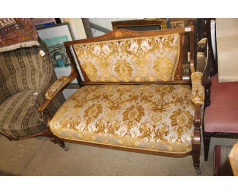 An Edwardian salon sofa