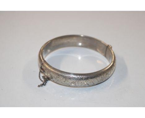 A 1963 T.H. Ltd Birmingham Sterling silver bangle, approx. 20gms 