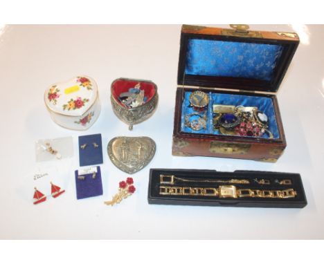 A box containing Cottage Rose heart shaped jar and cover and contents of various ear-rings; an Oriental decorated trinket box