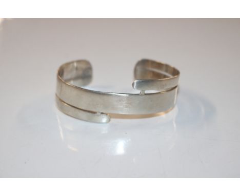 A Sterling silver cuff bangle, approx. 26gms 