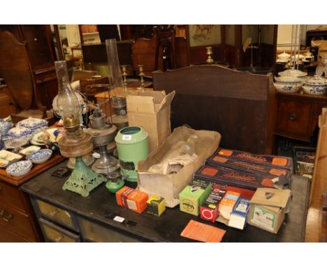 A Hinks oil lamp and various other oil lamps, Aladdin chimneys etc.