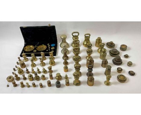 A large collection of Victorian and later brass scales weights 