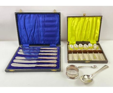 A cased set of silver coffee spoons, a silver napkin ring, silver tea spoon and a silver salt spoon, 99.65g gross; and a case