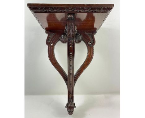 A 20th century mahogany wall bracket 
