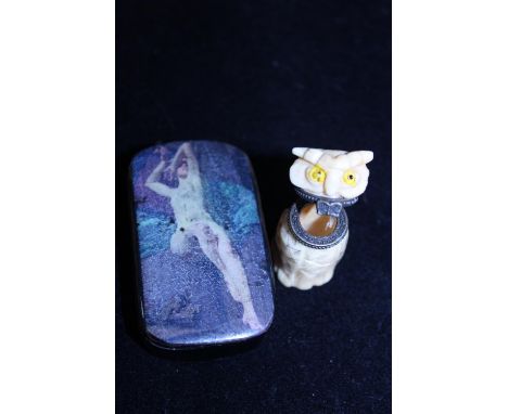 A antique Papier Mache snuff box along with a carved owl form snuff box 