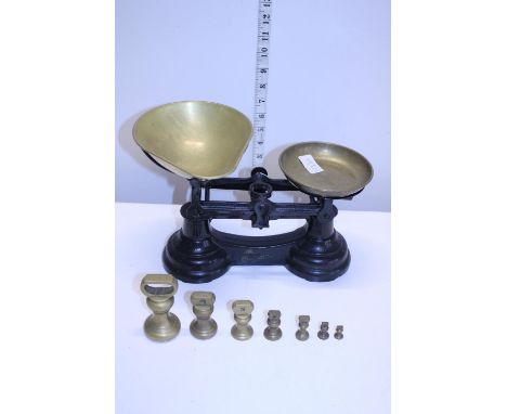 A pair of vintage scales and brass weights, shipping unavailable 