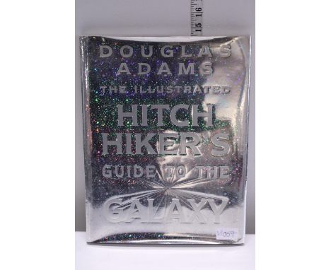 A hardback book by Douglas Adams 'The Illustrated Hitchhikers Guide to the Galaxy' 