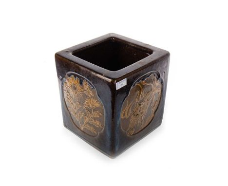 CHINESE EARTHENWARE PLANTER, EARLY 20TH CENTURY slip decorated with four vignettes in shaped surrounds against high-fired blu