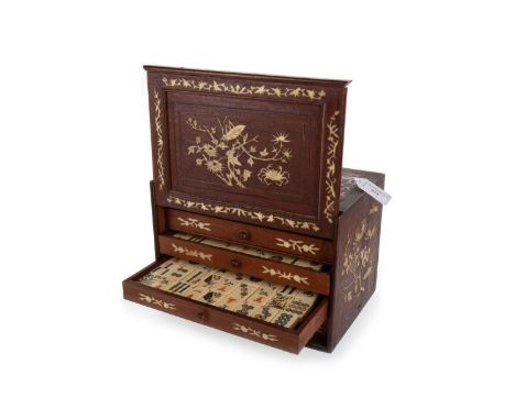 CHINESE MAHJONG SET, EARLY 20TH CENTURY  a set of bone and bamboo counters, contained in a stained wood case inlaid in bone w