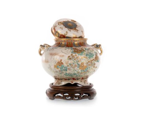 JAPANESE SATSUMA KORO AND COVER, MEIJI PERIOD (1868 - 1912) with twin mythical creature handles, decorated with a continuous 