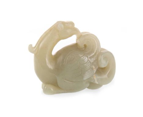 CHINESE CARVED JADE FIGURE, LATE 19TH/EARLY 20TH CENTURY modelled as a phoenix, with white inclusions6.3cm high